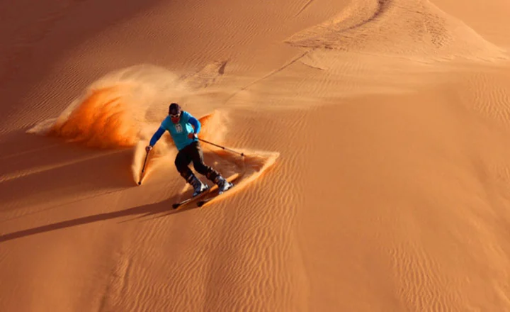 Sandboarding in the Arabian Desert